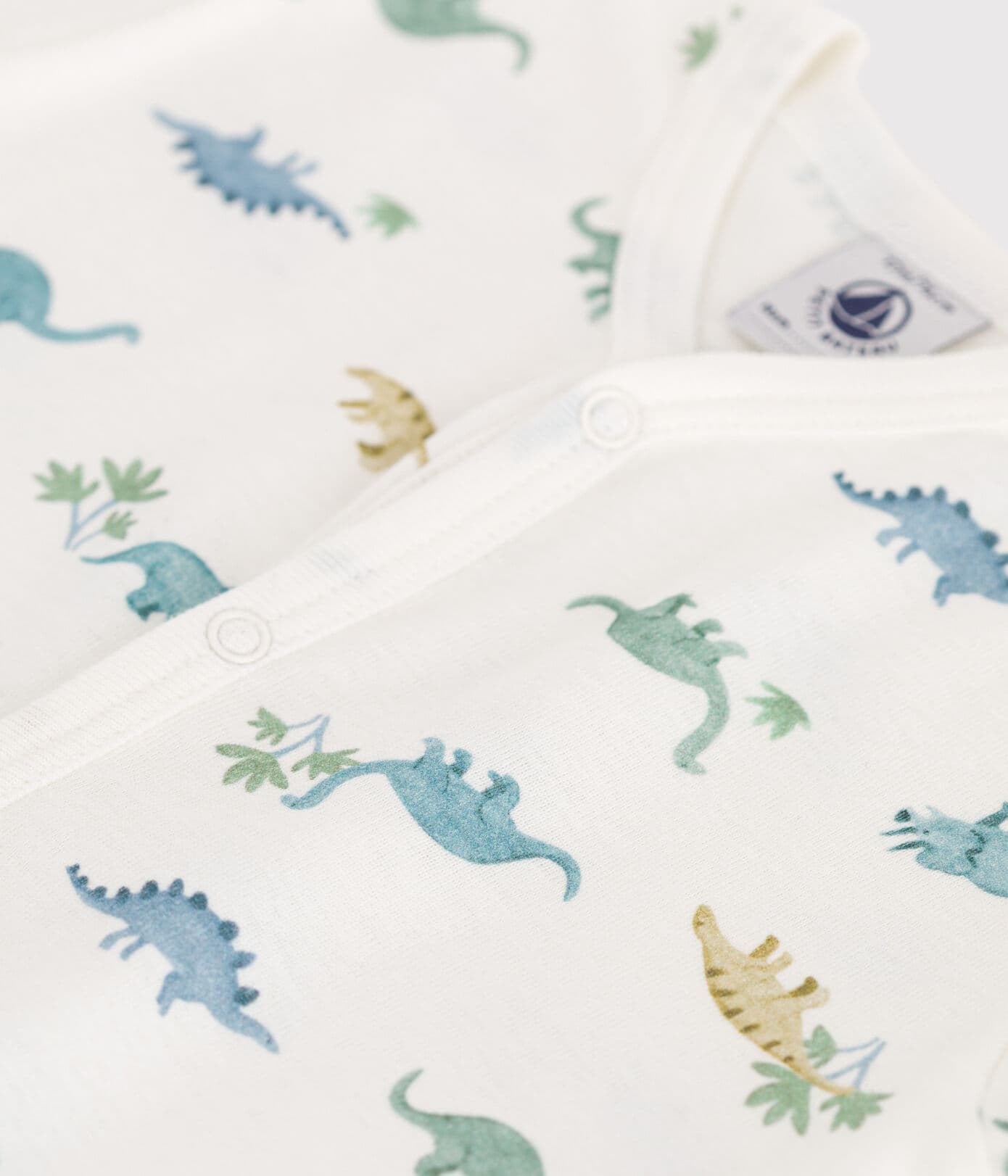 Baby-Kurzoverall aus Baumwolle mit Dinos